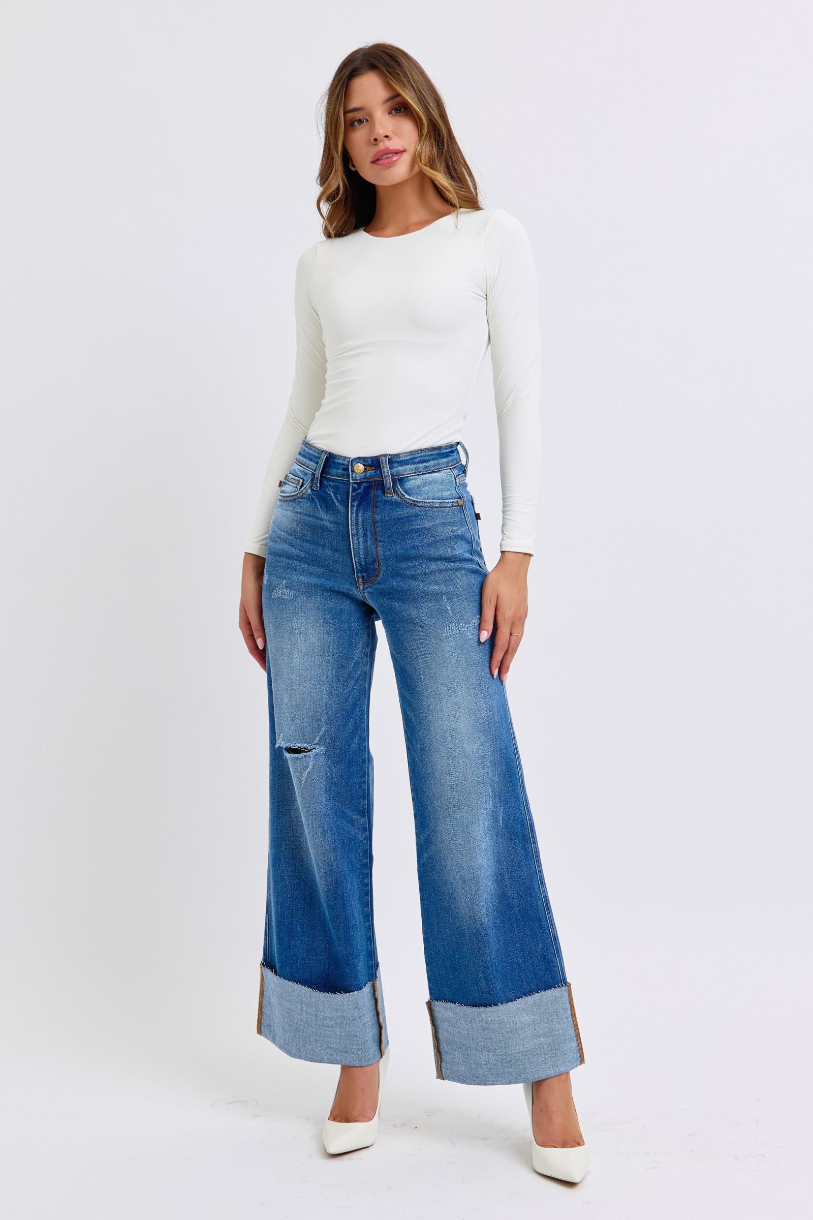 Model wearing Elysian Distressed Wide-Leg Denim jeans