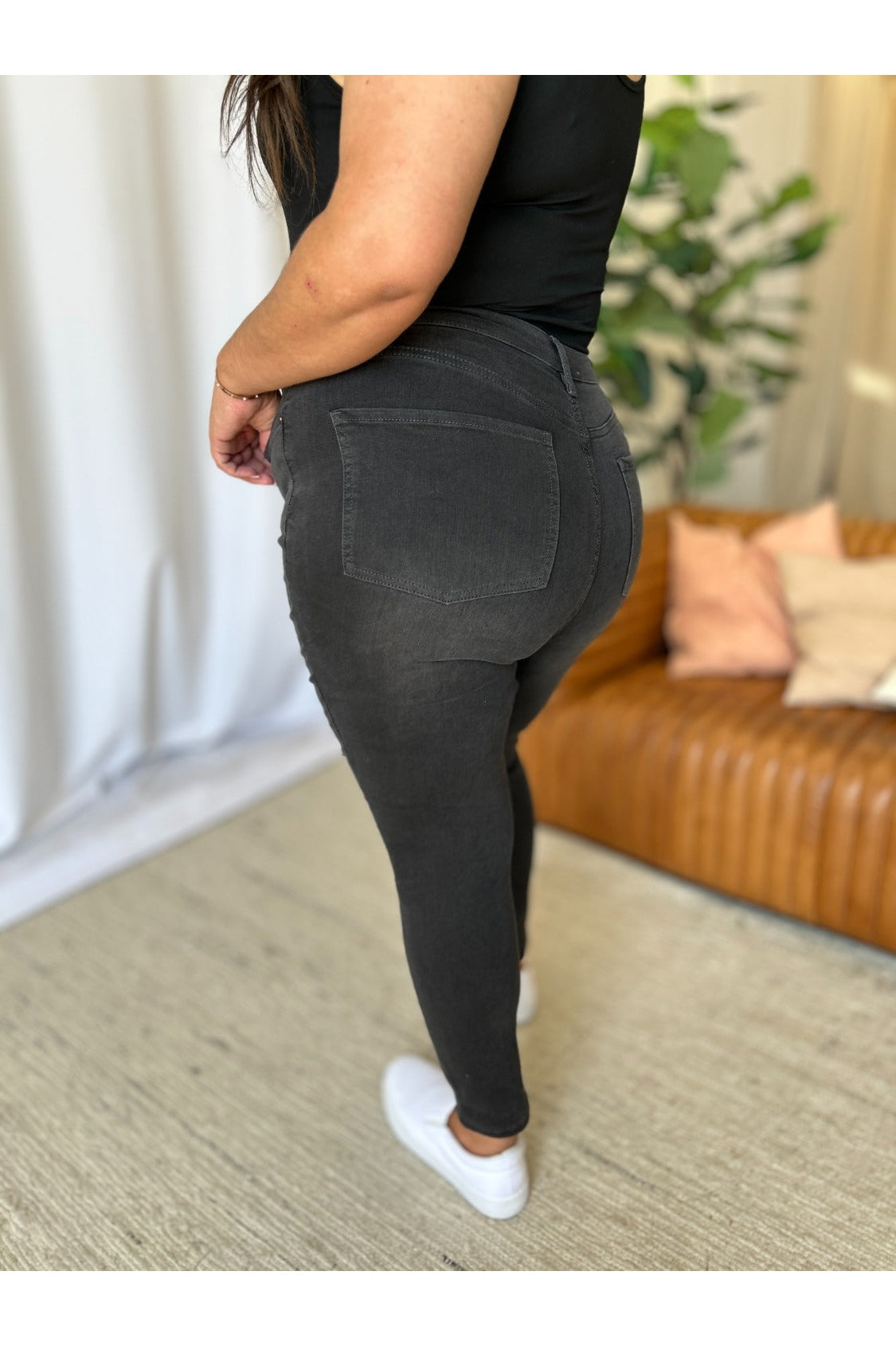 High rise tummy control skinny jeans side view plus size