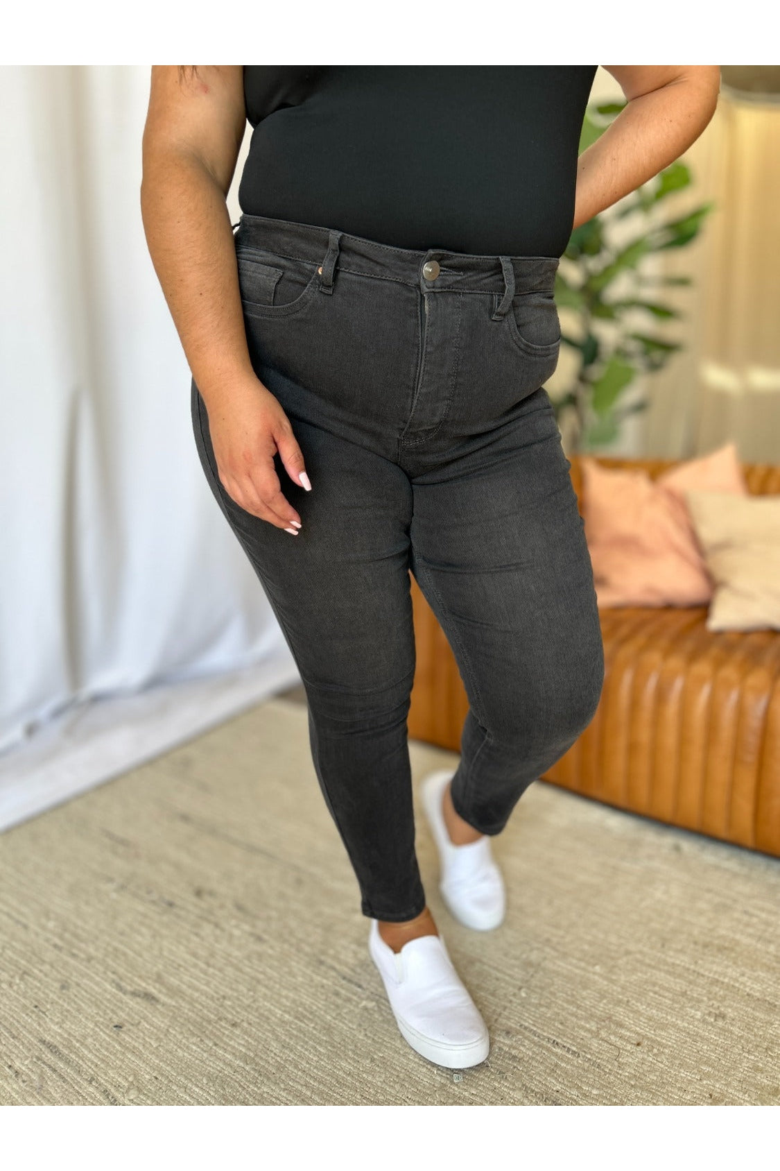 High rise tummy control skinny jeans front view plus size
