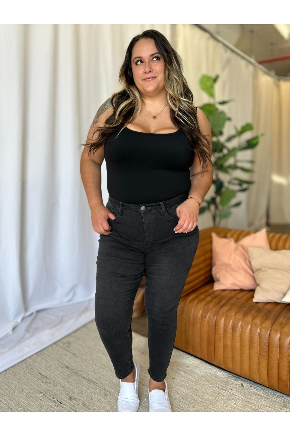 High rise tummy control skinny jeans front view plus size