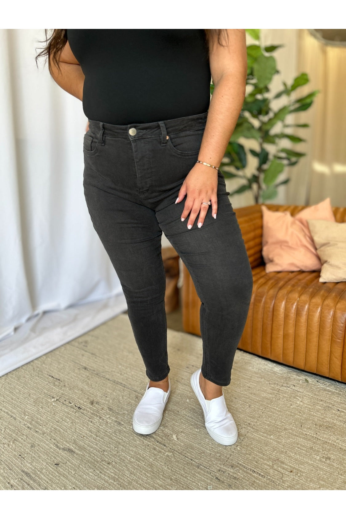 High rise tummy control skinny jeans front view plus size
