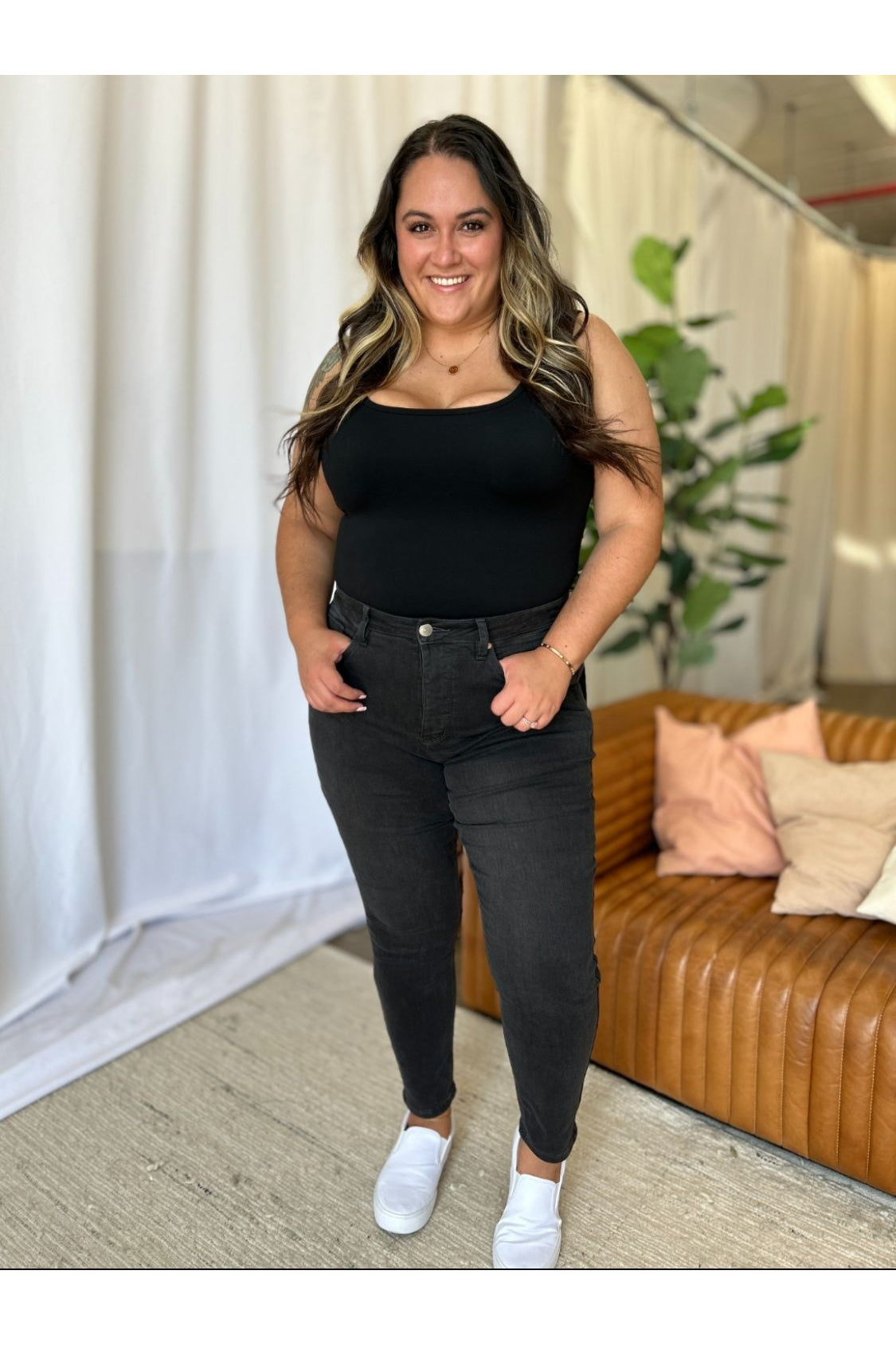 High rise tummy control skinny jeans front view plus size