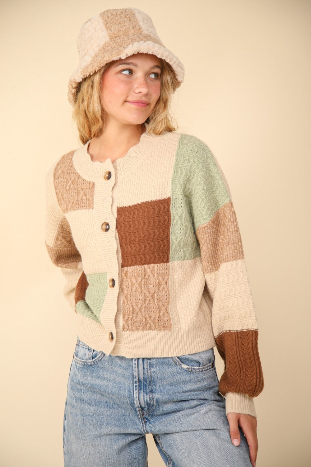 Model wearing Vibrant Harmony Cardigan with button details