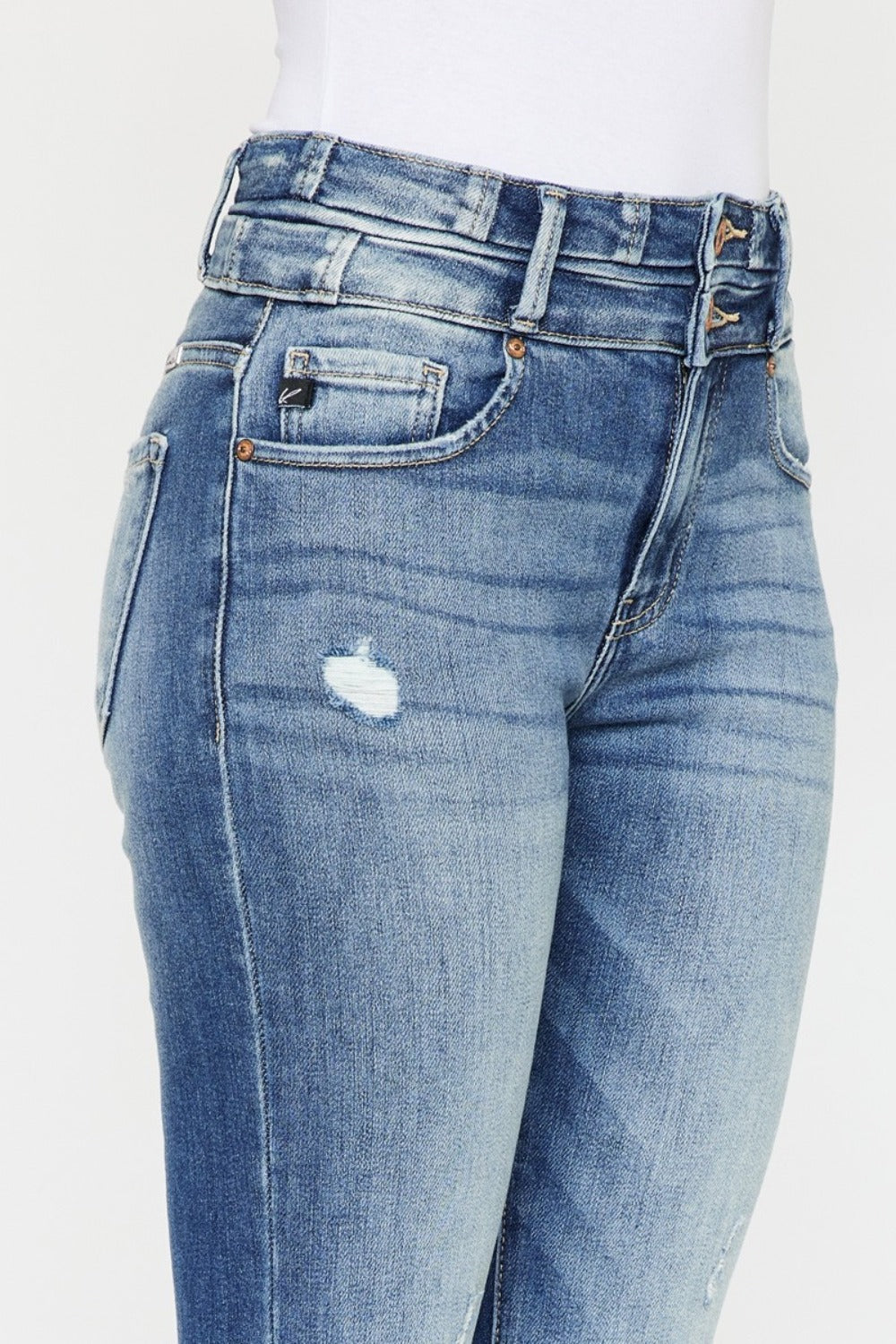 Close-up of Zephyr Curve Flare jeans front details