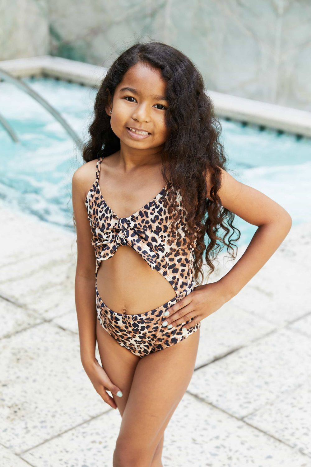 Little girl in hot sale one piece swimsuit