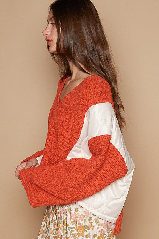 Side profile of Autumnal Elegance Knit Top in orange