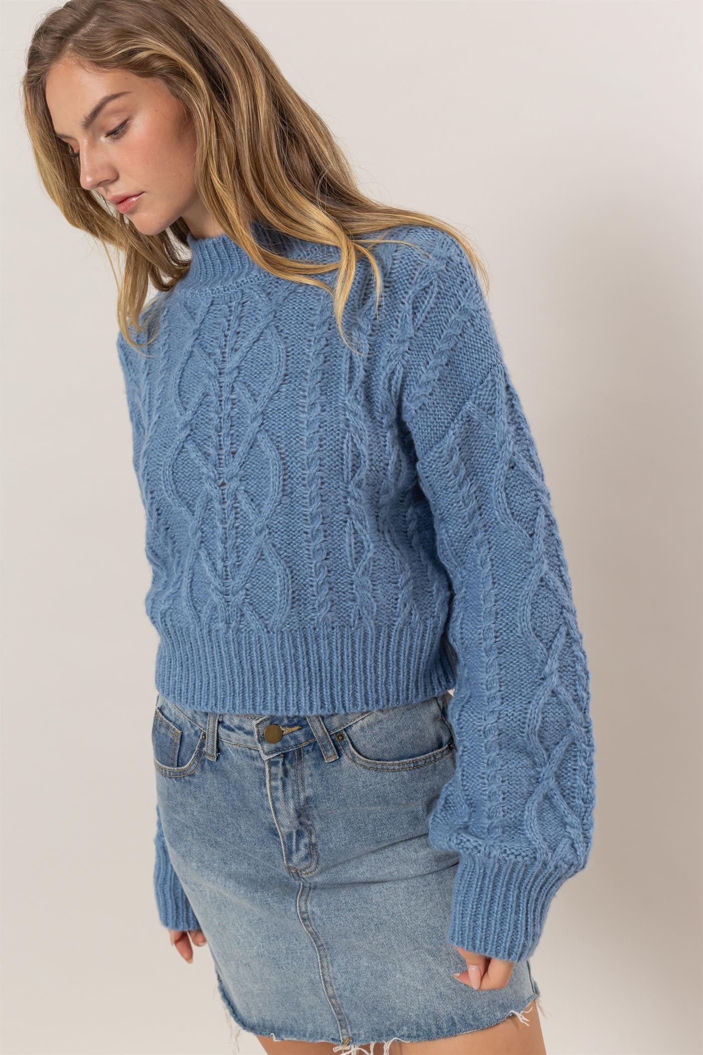 Side view of blue Éclat Weave Mock Sweater.