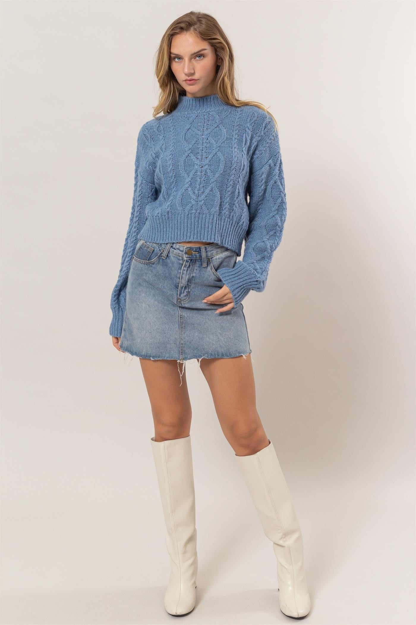 Full outfit with blue Éclat Weave Mock Sweater and denim skirt.