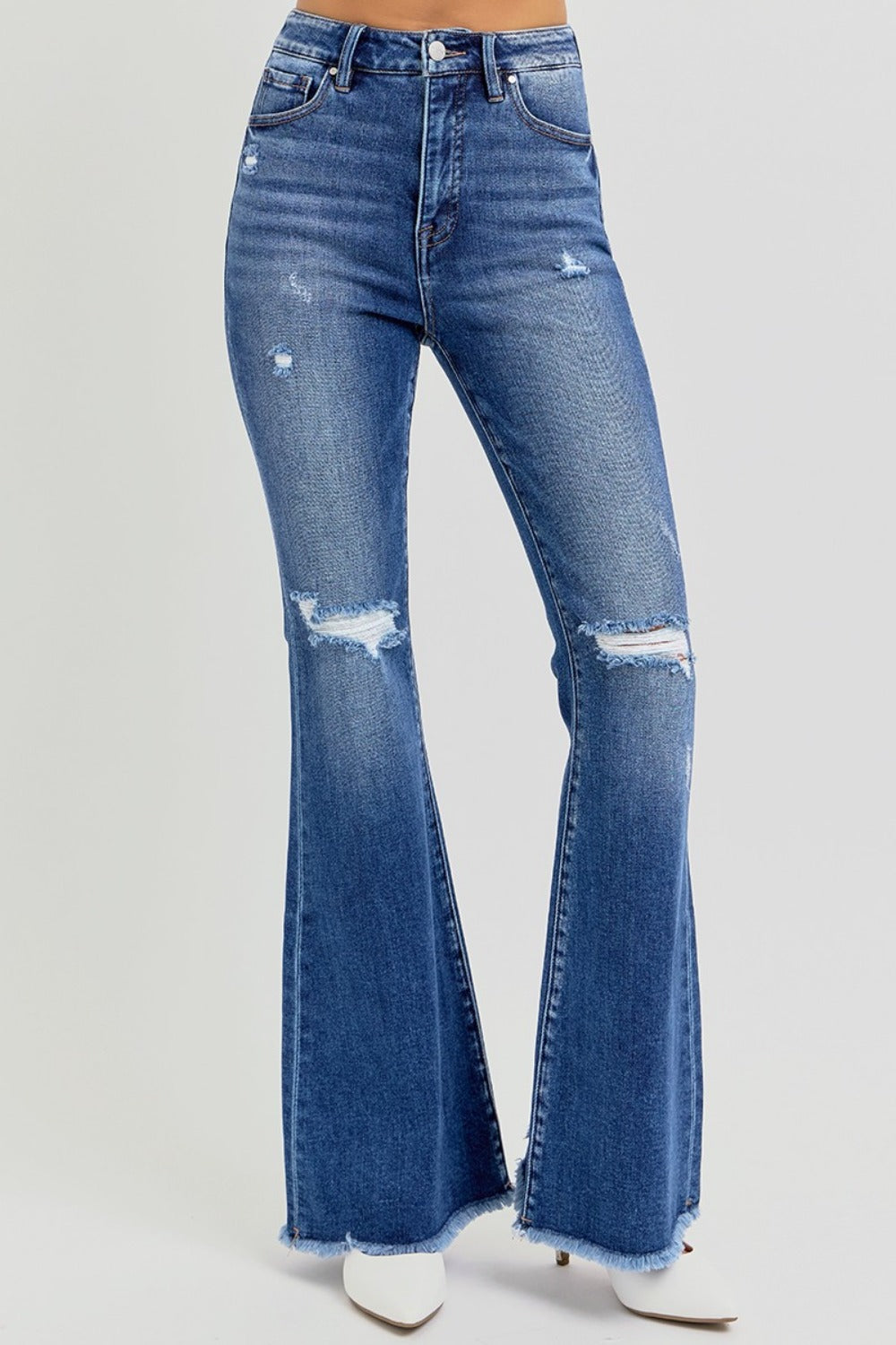 Front view of trendy wide-leg distressed jeans