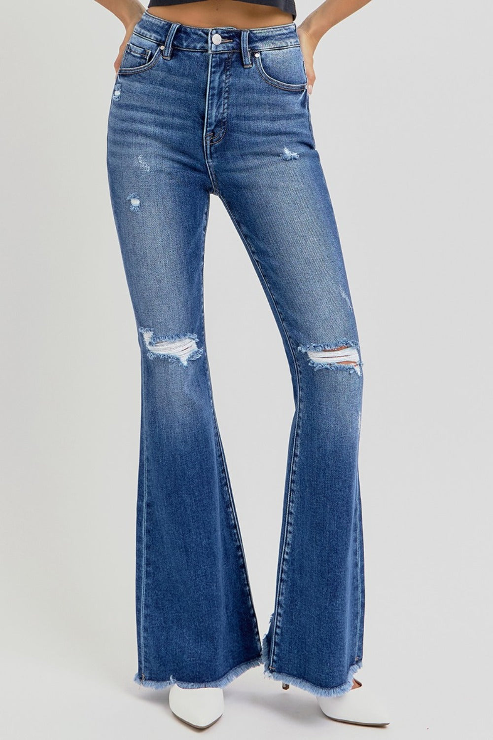 High-rise flare jeans with raw hem, front view