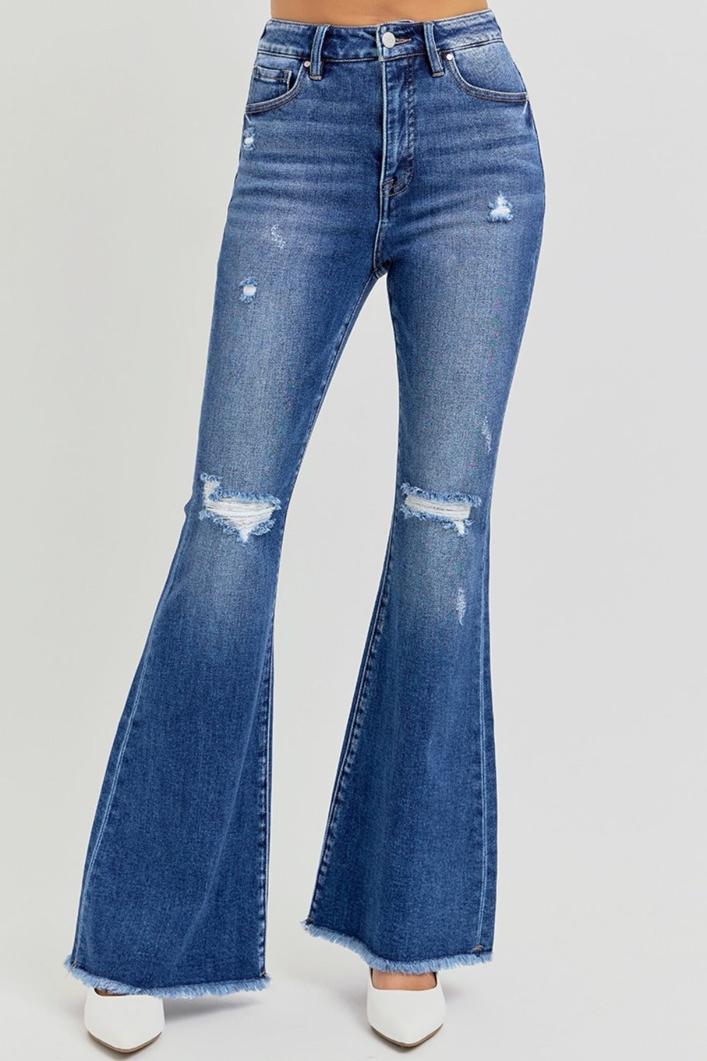 High-rise distressed flare jeans with raw hem, front view