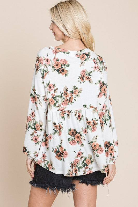 Floral babydoll blouse with bishop sleeves, back view