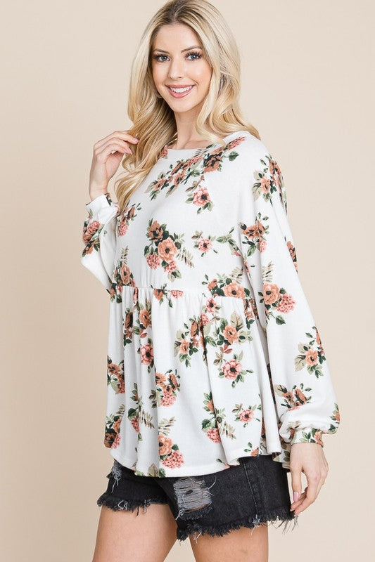 Floral babydoll blouse with bishop sleeves, side view