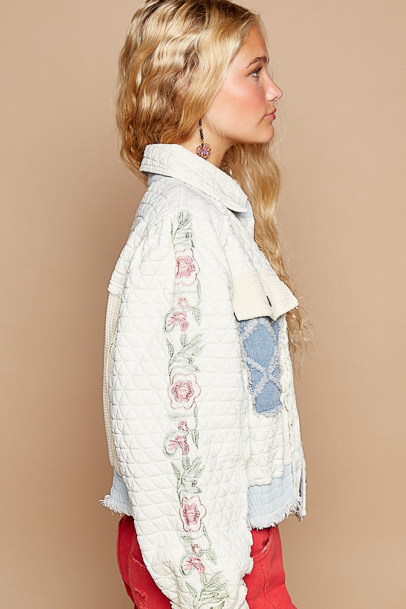 Side view of Fleuric Quilted Coat with floral details