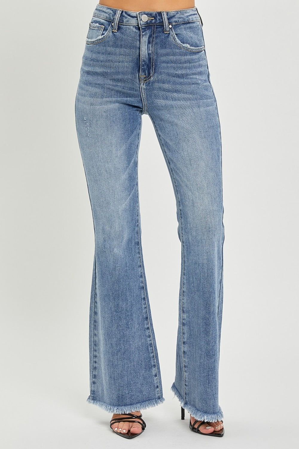 Front view of high waist raw hem flare jeans