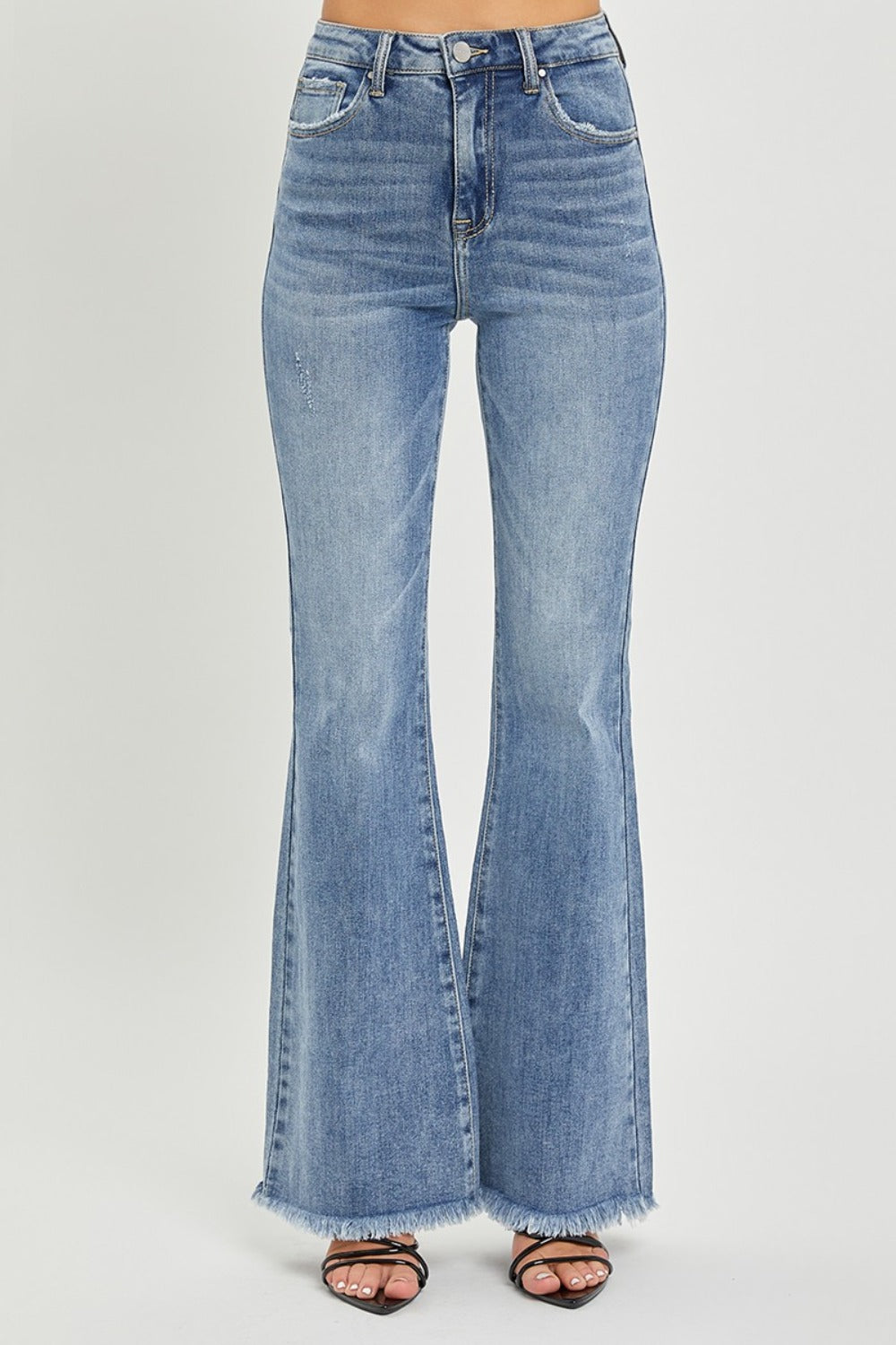 Front close-up of high waist raw hem flare jeans