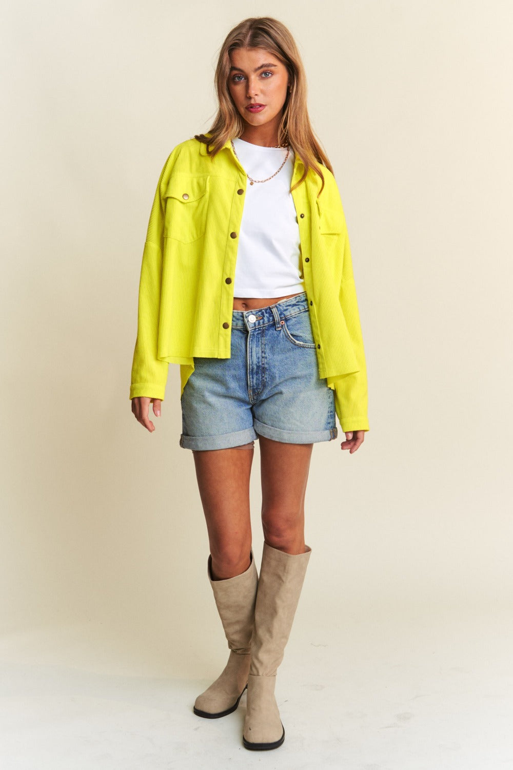 Limonette Glow Shacket styled with shorts and boots.