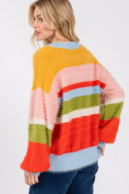 Back view of colorblock sweater with vibrant stripes