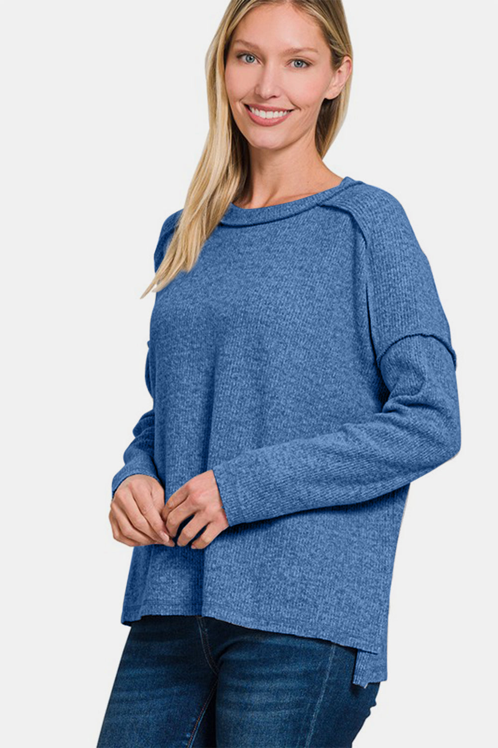 Nautical Sophistiqué blue sweater with exposed seams, side view