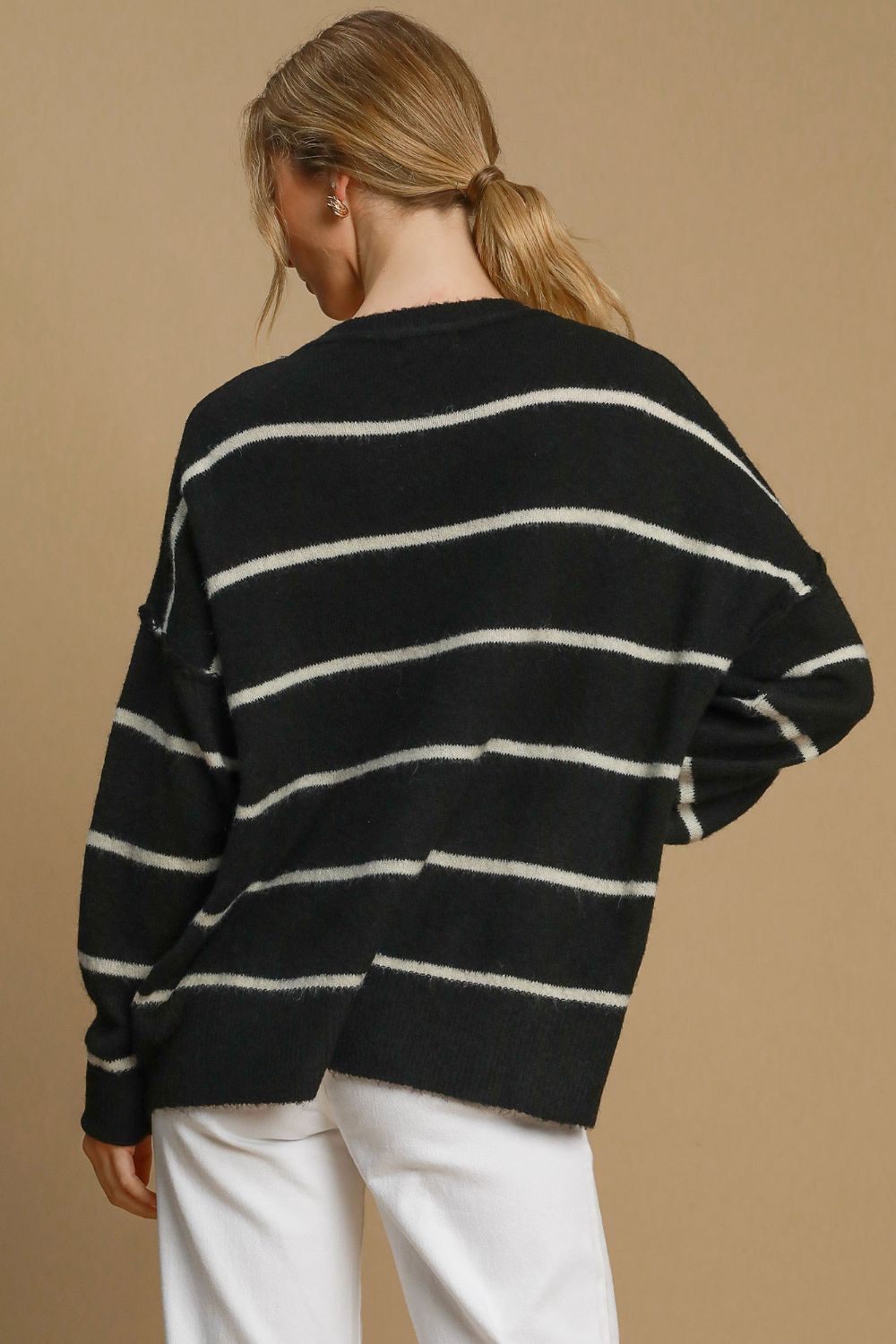 Black and cream striped wool sweater, back view