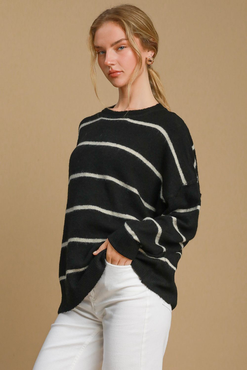 Black and cream striped wool sweater, side view