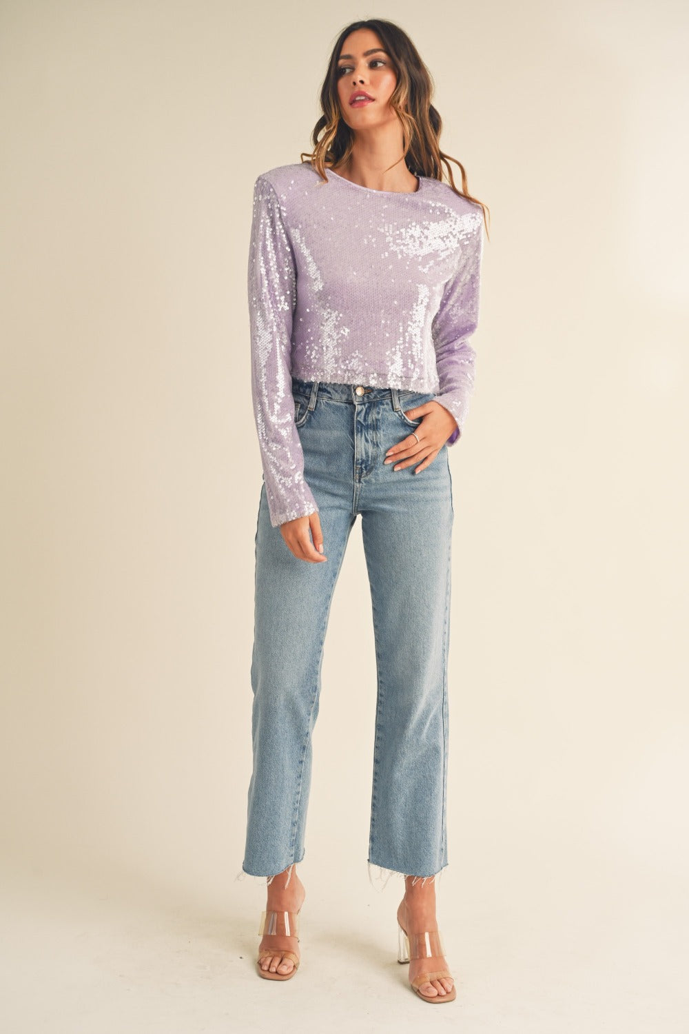 Front view of lavender sequin crop top with shoulder pads