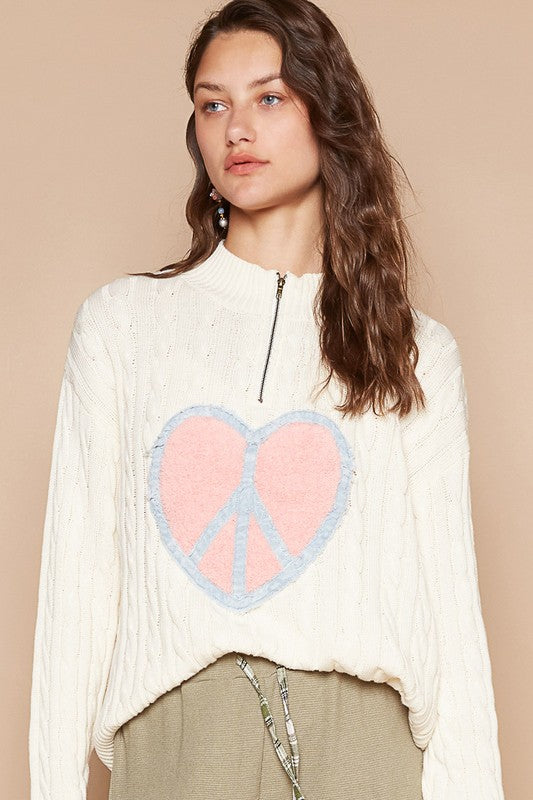 Tranquil Harmony Cable-Knit Sweater with peace heart design