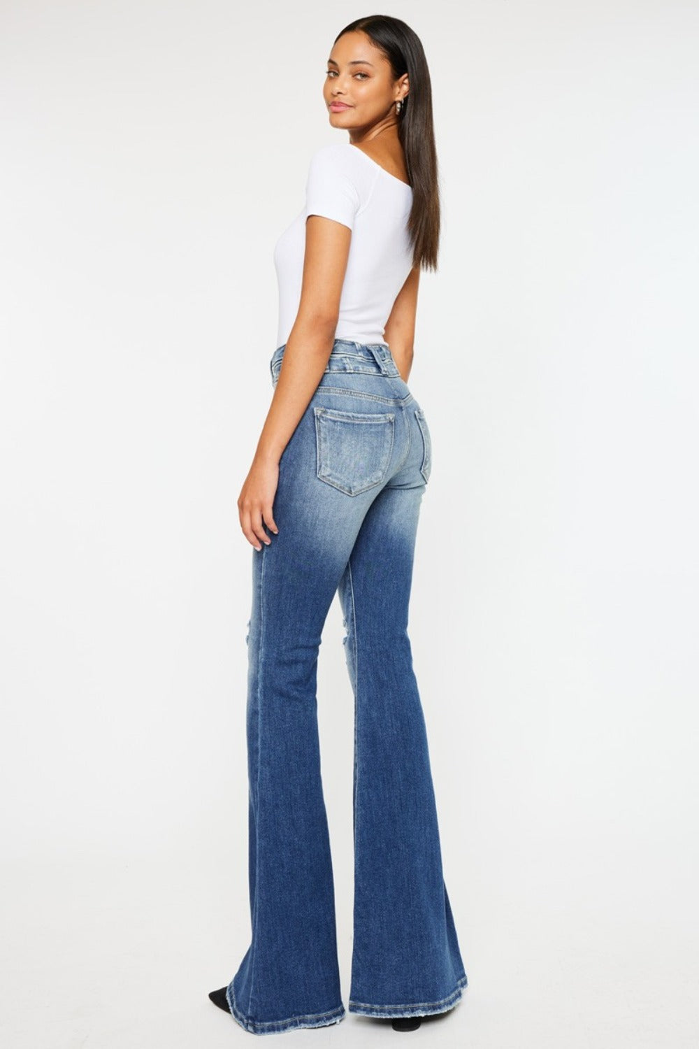 Back view of Zephyr Curve Flare distressed jeans