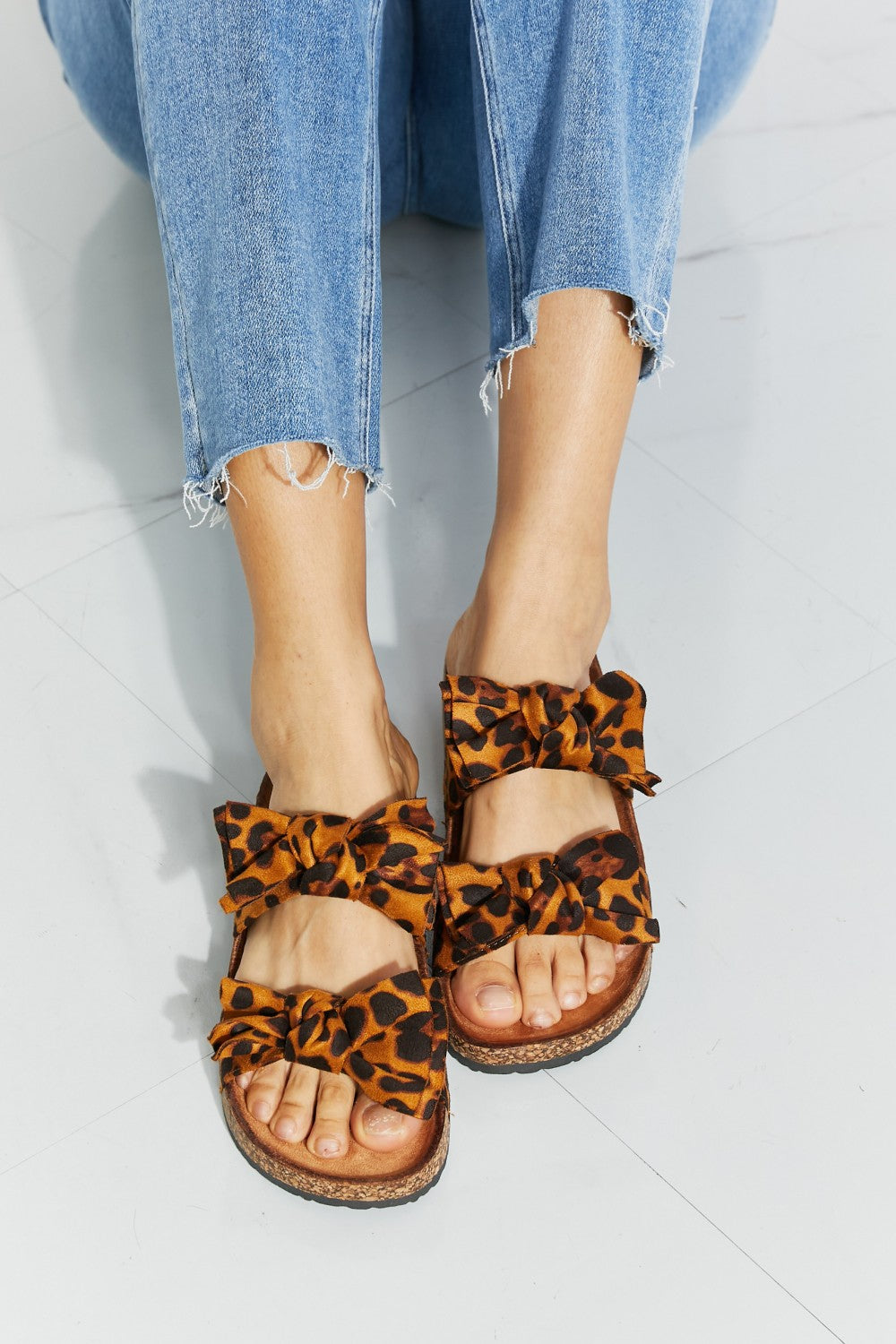 Forever Link Fiercely Feminine Leopard Bow Slide Sandals | - CHANELIA