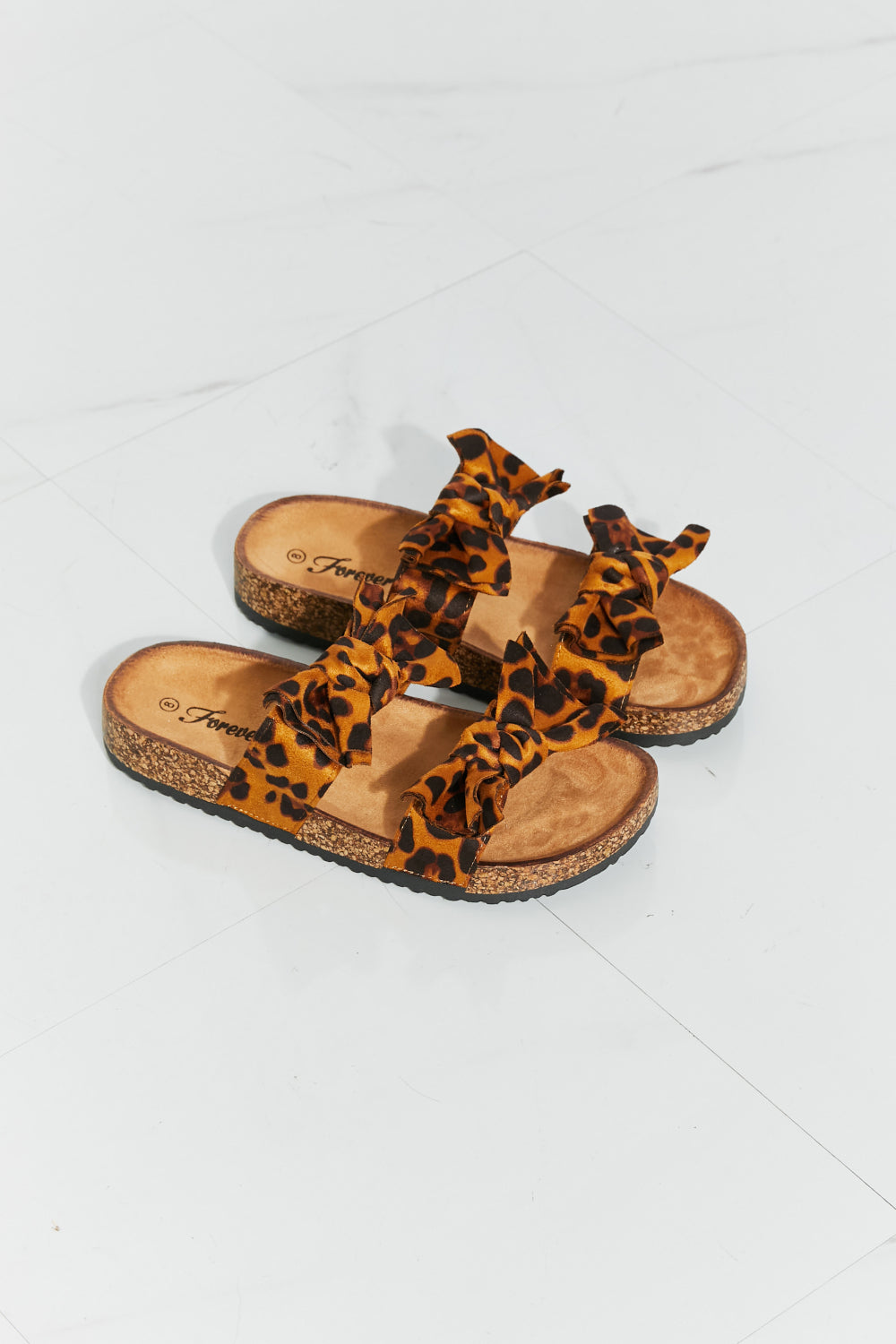 Forever Link Fiercely Feminine Leopard Bow Slide Sandals | - CHANELIA
